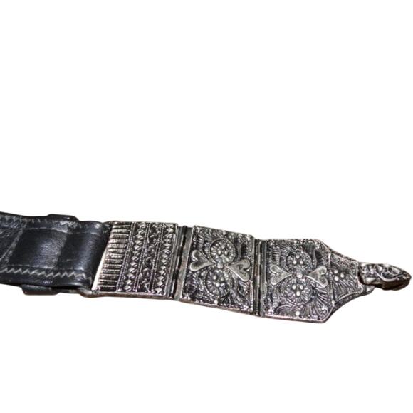 hammered metal artist made belt buckle with black leather belt